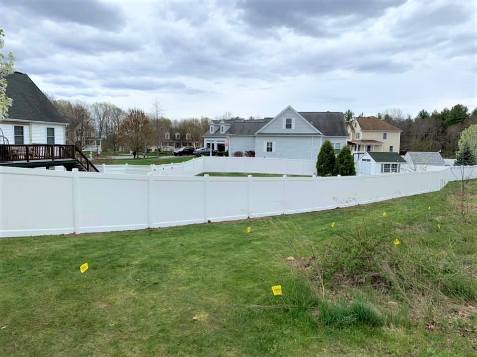 Photo of a vinyl fence in a residential area